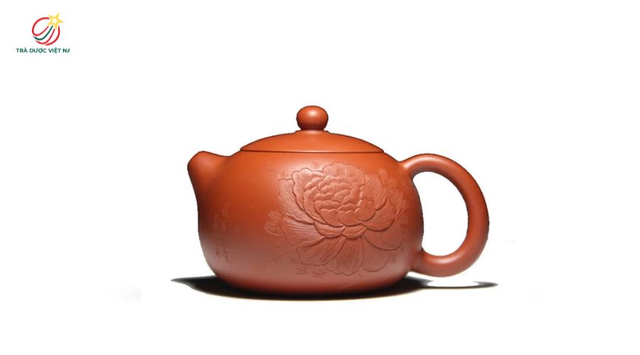 Dáng ấm Tây Thi có thân ấm tròn đầy và quai ấm ngược